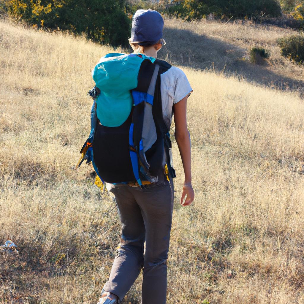 Person hiking with backpack outdoors